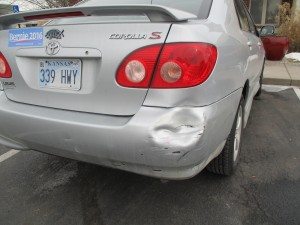 2006 Toyota Corolla dented bumper