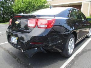 vehicle with damage to back end and fender