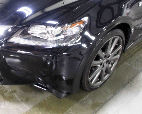 Small vehicle damage to the front of a 2015 Lexus.