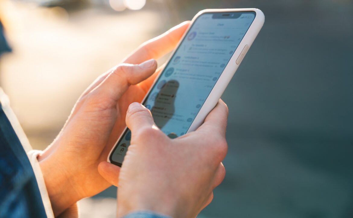 Close up of a woman using mobile phone