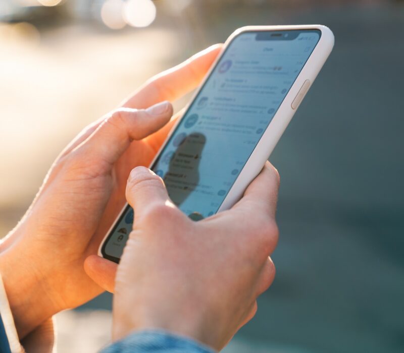 Close up of a woman using mobile phone